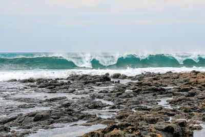 Waves splashing on rocks