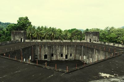 View of abandoned building against clear sky