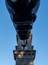 Low angle view of tower against clear blue sky