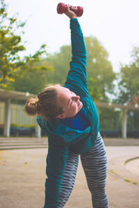 Young woman exercising outdoors