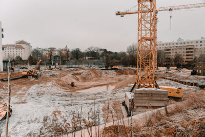 Construction site on field against sky