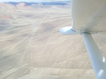 Airplane flying over landscape