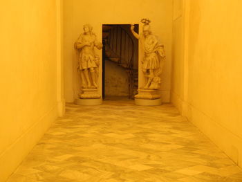 Statue in corridor of building