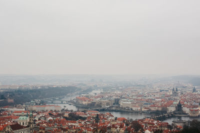 Aerial view of cityscape against clear sky