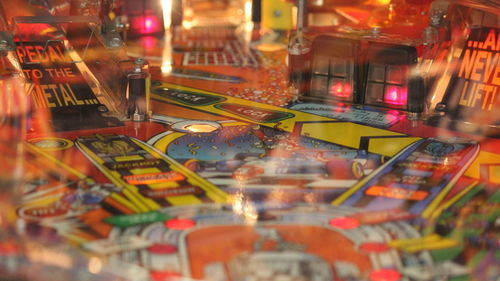 Close-up of illuminated glass for sale in store