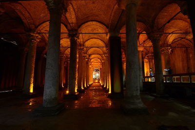 Illuminated corridor of building