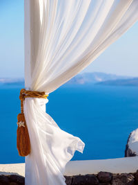 White curtain on terrasse on the island santorini. amazing luxury resort. cyclades, greece.