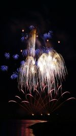 Firework display at night