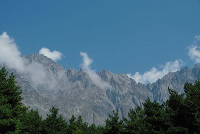 Low angle view of mountains against sky