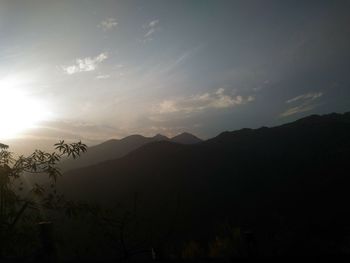 Scenic view of mountains at sunset