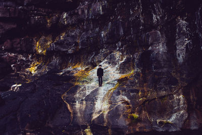 Person standing on rock