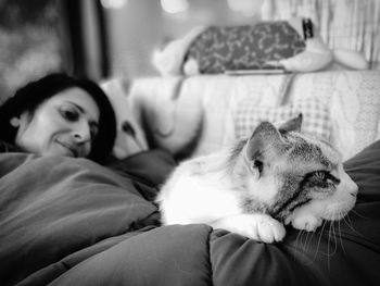 Portrait of baby lying on sofa at home