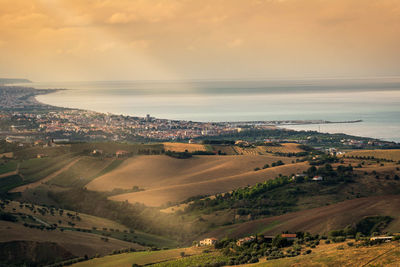 High angle view of landscape against sky during sunset