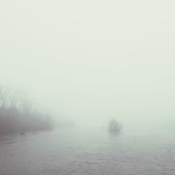 Scenic view of landscape during foggy weather