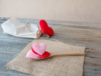 Close-up of heart shape on table