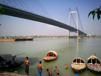 View of suspension bridge over river