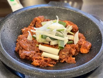 High angle view of meat in plate on table