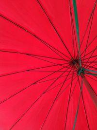 Low angle view of red umbrella