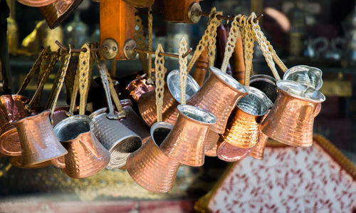 Close-up of clothes hanging for sale at market stall