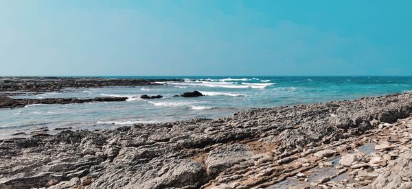 Scenic view of sea against clear sky