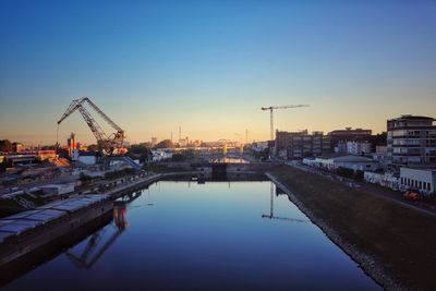 River by city against clear sky