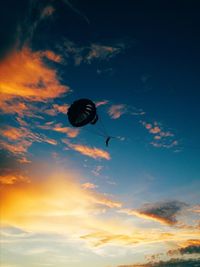 Low angle view of parachute against sky