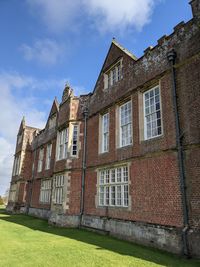 Low angle view of old building against sky
