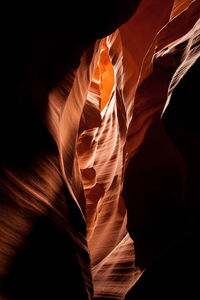 Sunlight falling on rock formations in cave