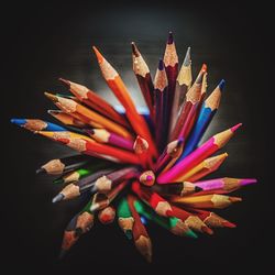 High angle view of multi colored pencils on table