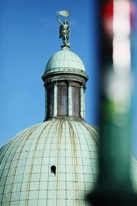 Statue of liberty against blue sky