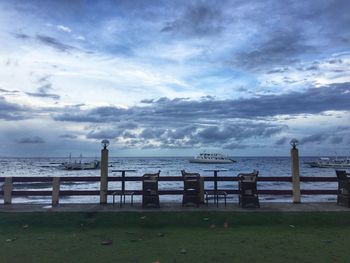 Scenic view of sea against cloudy sky