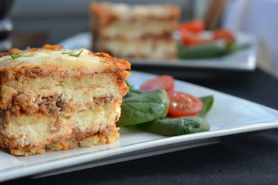Close-up of sandwich served in plate on table