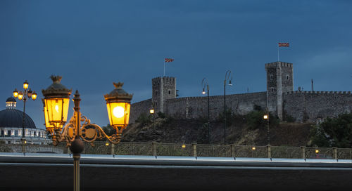 Evening city castle skopje in macedonia in the evening and street lamp. selective focus