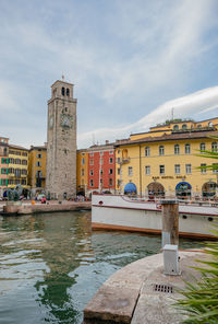 View of buildings against cloudy sky