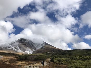 Scenic view top of mount asahideke with smoke of hot spring or onsen, hokkaido