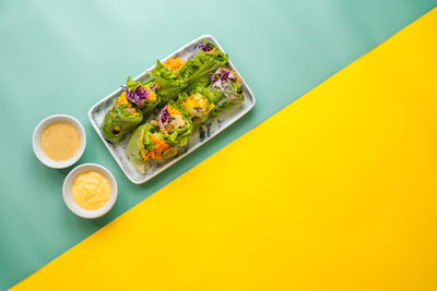 High angle view of sushi served on table
