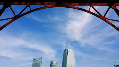 Low angle view of skyscrapers against sky