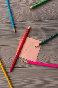 High angle view of pen and book on table