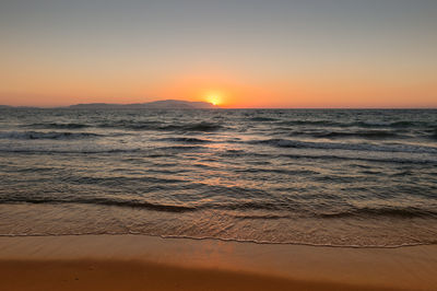 Idyllic shot of sea against sky during sunset