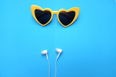 Close-up of heart shape against blue background