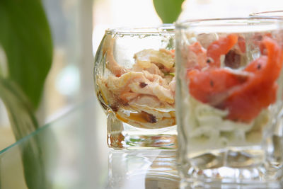 Close-up of ice cream in glass on table