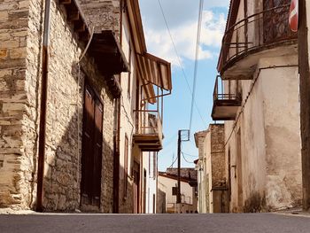 Low angle view of old buildings against sky