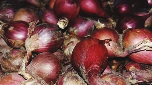 Full frame shot of onions for sale at market