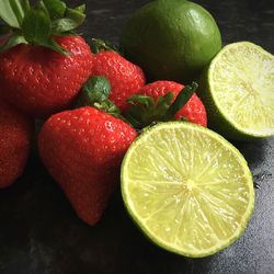 Close-up of fruits on wooden table