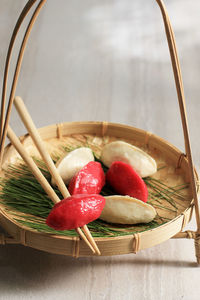 Close-up of food in wicker basket on table