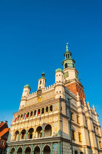 Low angle view of building against blue sky