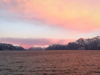 Scenic view of mountains against sky during sunset
