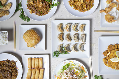 Top view of traditional chinese food on restaurant table