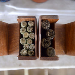 Directly above shot of weed in wooden container