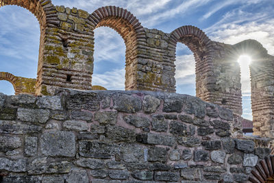 Low angle view of historic building against sky